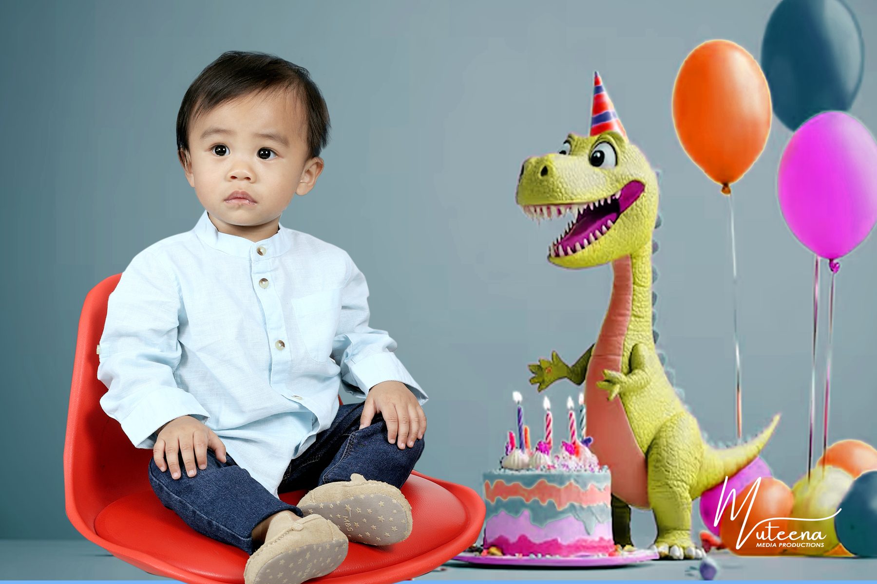 First birthday studio shoot with cake, balloons and dinosaur props photographed in Al Muteena, Dubai